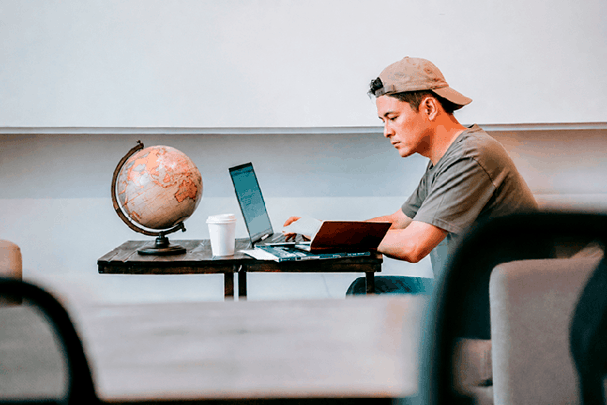 A Vividly IT team member managing device logistics for a six-country remote workforce